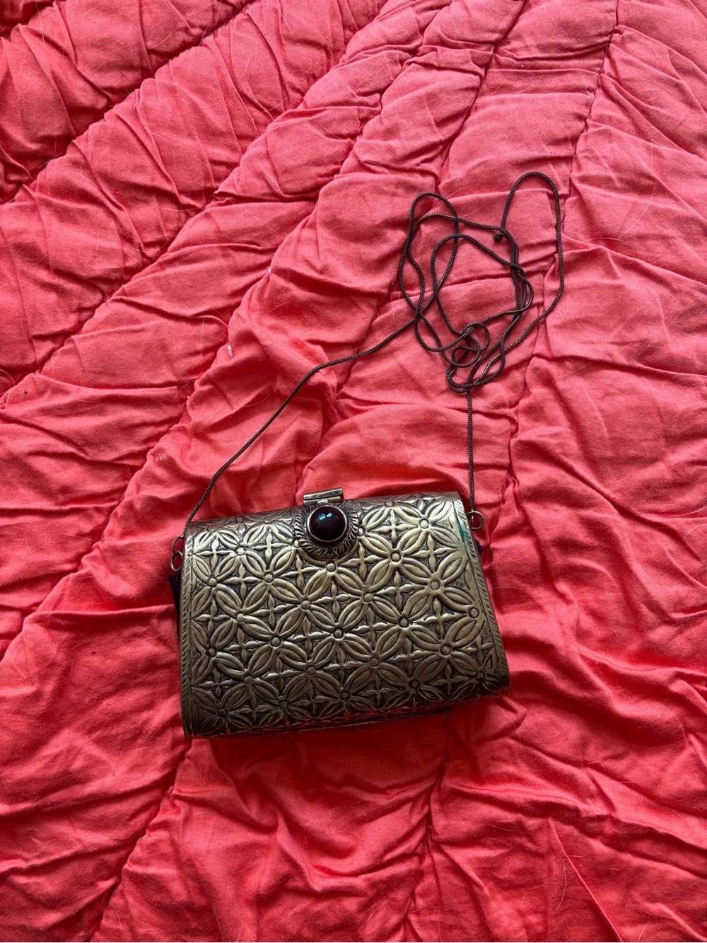 From St. Xavier Floral Metal Clutch in Bronze with Decorative Stone Accent